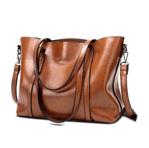 Vintage chic cowhide handbag with large shoulder bag slanted
